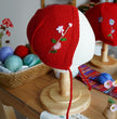 Red Bonnet with Hand Embroidered Spring