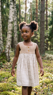 Young girl wearing the natural crochet dress