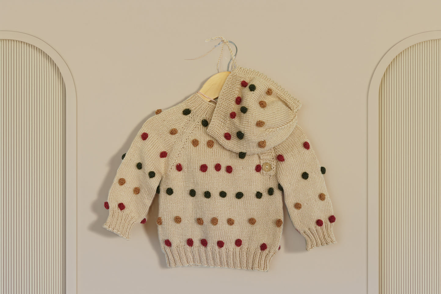 Hand-Knitted Polka Dot Baby Sweater with Bonnet